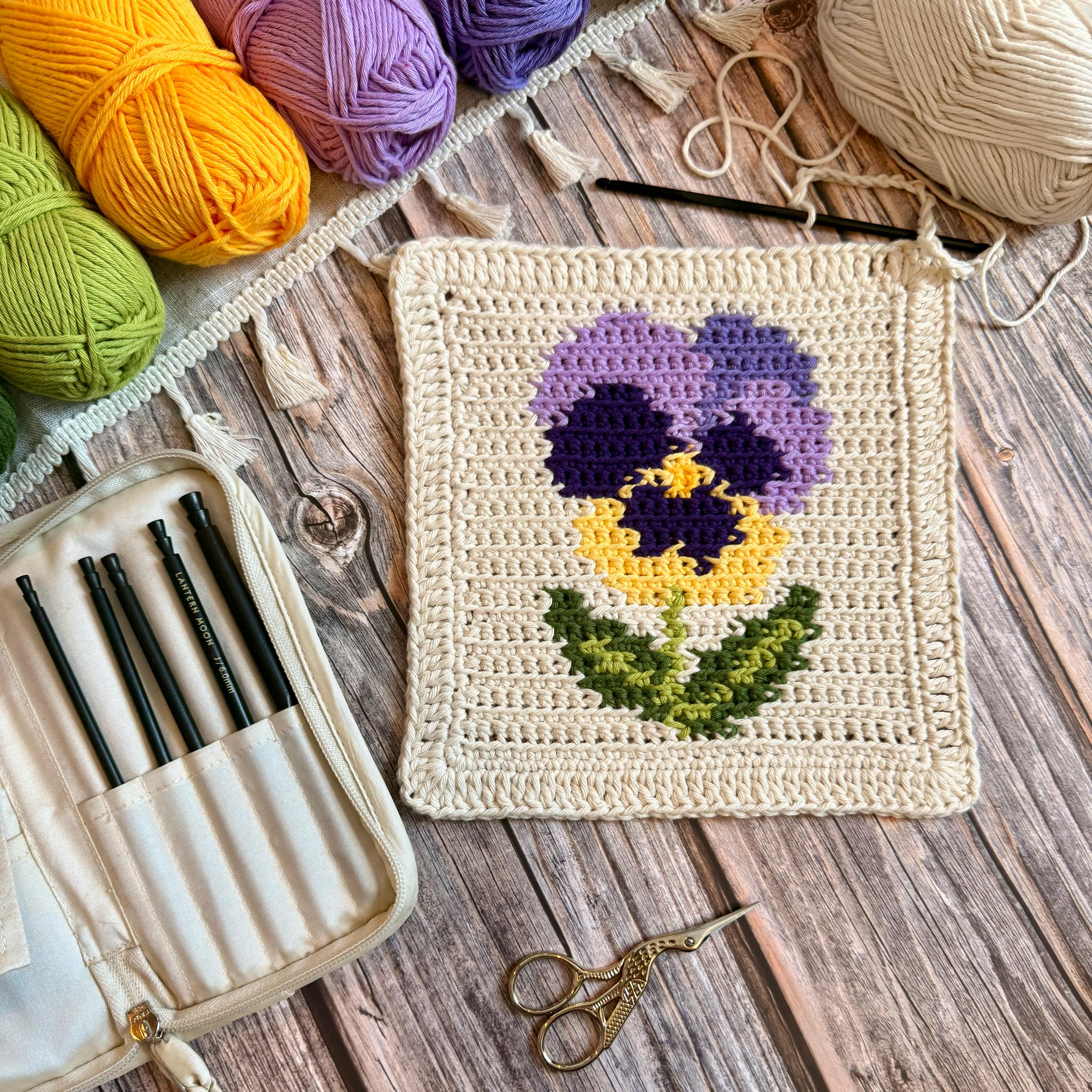 30 Pansy Crochet Patterns for Flowers, Decor, and Wearable Details 27 Pansy Dishcloth Tapestry Crochet Pattern