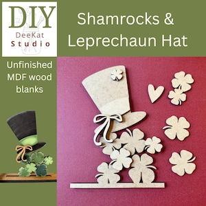 May include: Unfinished MDF wood blanks featuring a leprechaun hat, a heart, and multiple shamrock shapes. The set includes a base piece for assembly. The text "DIY DeeKat Studio Shamrocks & Leprechaun Hat Unfinished MDF wood blanks" is visible.