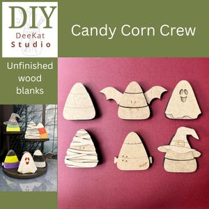May include: Unfinished wood blanks featuring a Halloween theme. The image displays various wooden cutouts shaped like candy corn, a bat, a ghost, and a mummy. The text "Candy Corn Crew" is visible. The DIY DeeKat Studio logo is also present.