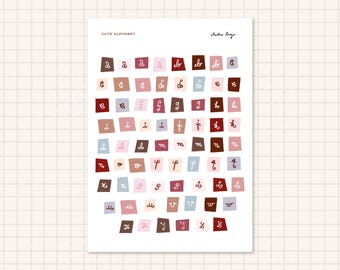 Arkusz pastelowych, czerwonych i brązowych naklejek z literami o minimalistycznej estetyce, idealny do dzienników, scrapbookingu i nie tylko.