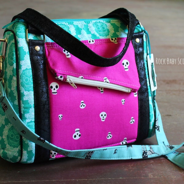 Teal, Pink, Black and Blue Halloween skulls and cats Rockstar Bag with removable shoulder strap and leather handles