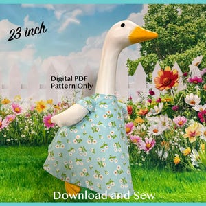 May include: A white goose figurine wearing a light blue dress with a white daisy pattern. The text 23 inch and Digital PDF Pattern Only are visible. The goose has a yellow beak and is positioned against a garden background with flowers.