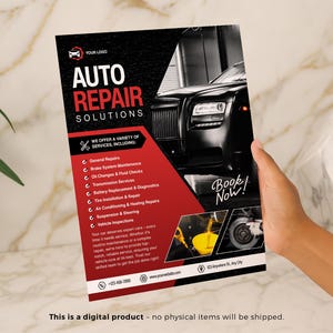 May include: A flyer for auto repair services, held by a hand. The flyer features the text "AUTO REPAIR SOLUTIONS" in red and white, along with a black car graphic. Services include general repairs, brake maintenance, and more. The flyer also says "Book Now!"