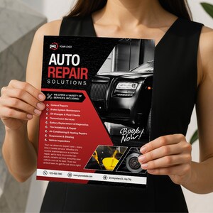 May include: A flyer for auto repair services held by a person. The flyer has a black and red color scheme with the words "AUTO REPAIR SOLUTIONS" in large white letters. It lists various services and features a black car and the words "Book Now!"