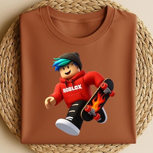 May include: A brown t-shirt featuring a Roblox character with blue and green hair, wearing a red hoodie with the Roblox logo, black pants, and white shoes. The character is holding a skateboard with a flame design.