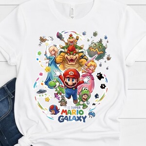 Super Mario Galaxy Movie Poster Shirt, Mario Since 85 Tee, Nintendo World Family Matching Tee, Nintendo Super Mario Birthday Gift image 1
