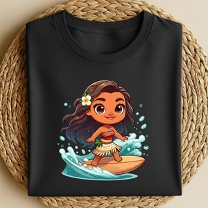 May include: Black crew neck t-shirt featuring a cartoon illustration of a girl surfing on a surfboard. The girl has brown hair, a flower, and is wearing a skirt. The surfboard is light brown, and the waves are blue and white.