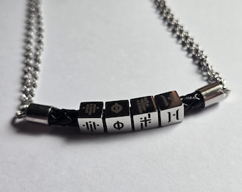 Leren en roestvrijstalen ketting met het symbool van Tyler Joseph
