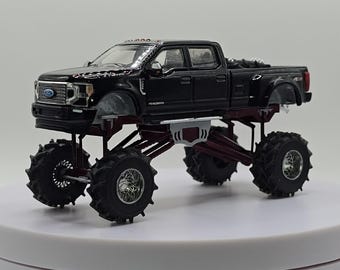 1/64 Custom 2022 F350 Mega Mud Truck with Black Paint and Maroon Suspension