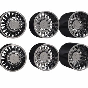 May include: Six black and chrome alloy wheels. Each wheel features a multi-spoke design with a polished chrome rim and a black center. The center of each wheel has a silver "K" logo. The wheels are designed for a truck or SUV.