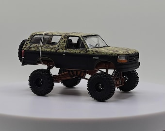 1/64 Custom OBS Camo Bronco and Bronze Suspension