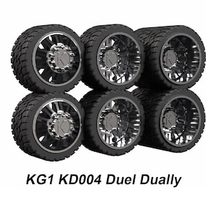 May include: Six black tires with silver rims, stacked in two rows of three. The tires are labeled "KG1 KD004 Duel Dually".