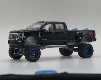 1/64 Custom 2022 F350 Metallic Black Paint with Silver AnyLevel Styled Suspension and Blue Wheels