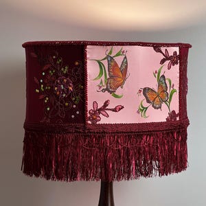 Burgundy lampshade with artistic painting on fabric, with beads and fringe, for a floor lamp, for cozy home decor.