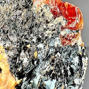 Vibrant Red Zircon Specimen: 154.60 Carat Raw Crystal Gemstone