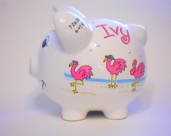 Personalized Piggy Bank Pink Flamingos on Beach with Sea Shells and Sand Castle