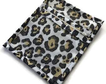 Zippered and Vinyl Small Accessory Bag in Animal Print Yellow and Black Fabric