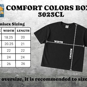 以下が含まれることがあります： Comfort Colors Boxy 3023CLとラベル付けされた黒の半袖Tシャツ。サイズ表にはSから2XLまでの幅と丈のインチ単位の測定値が表示されており、Tシャツ上の白い線が幅と丈の測定箇所を示しています。