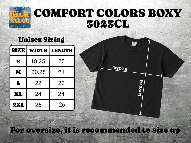 以下が含まれることがあります： Comfort Colors Boxy 3023CLとラベル付けされた黒の半袖Tシャツ。サイズ表にはSから2XLまでの幅と丈のインチ単位の測定値が表示されており、Tシャツ上の白い線が幅と丈の測定箇所を示しています。