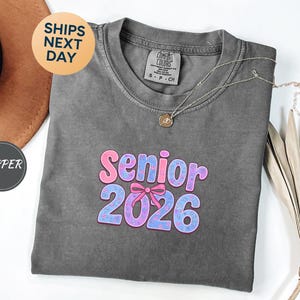 Comfort Colors Senior 2026 Shirt, Coquette Bow Senior 2026 Gift, Class of 2026 Senior Shirt,  Preppy Senior Shirt, Graduate 2026 Shirt-PH053