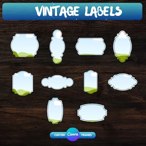May include: A collection of vintage labels in various shapes, including ovals, rectangles, and cloud-like forms. Each label features a light blue sky and green landscape design, outlined in white. The words "VINTAGE LABELS" are displayed in white, and the Canva Frames logo is at the bottom.