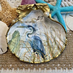 Decoupaged seashell ring holder/jewelry dish trinket dish with a beautiful image of a Blue Heron standing in seagrass.
