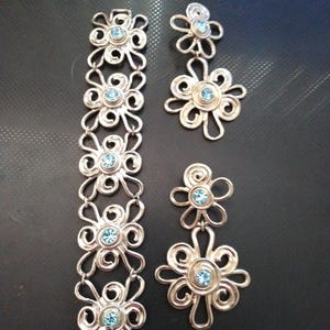 Avon Silver Link Bracelet and clip earrings with aquamarine stones