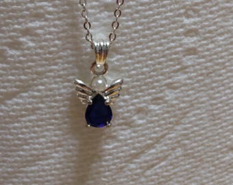 Vintage Avon Angel Pendant Necklace: Silver Chain, Blue Stone