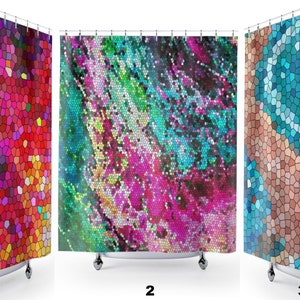 May include: Three shower curtains with a stained glass mosaic pattern. The first curtain is a rainbow of colors, the second is a mix of pink, green, and blue, and the third is a blue and brown mosaic.