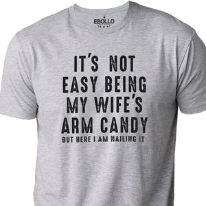 It&#39;s Not Easy Being My Wife&#39;s Arm Candy | Funny Dad Shirt - Perfect Father&#39;s Day Gift for Husband - Humorous Tee for Dads