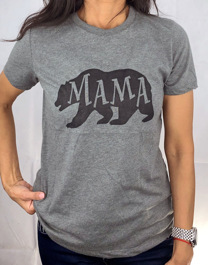 May include: Gray t-shirt with a black bear silhouette and the word "MAMA" inside the bear.