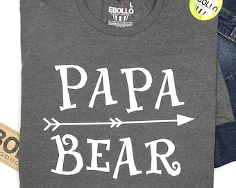 May include: Gray t-shirt with white text that reads "Papa Bear" with an arrow pointing to the right.