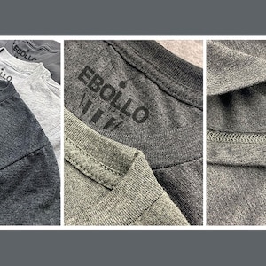 May include: A series of grey t-shirts, each displaying the word "EBOLLO" on the front. The image includes close-ups of the necklines and seams, showcasing the fabric's texture. The EBOLLO logo is also visible.
