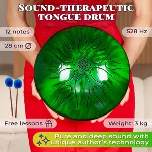 May include: A green tongue drum, 28 cm in diameter, with a unique design and 12 notes. The drum has the text "SOUND-THERAPEUTIC TONGUE DRUM" and "528 Hz". Includes two blue drum mallets and the text "Free lessons". The weight is 3 kg.