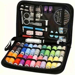 May include: A black zippered sewing kit, open to reveal various sewing supplies. The kit includes spools of colorful thread, needles, scissors, measuring tape, thimbles, and other essential tools for sewing and crafting.