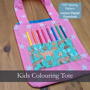 May include: A pink fabric tote bag featuring a white star pattern and a teal pocket with a woodland animal print. The pocket holds seven colored pencils. Text on the image reads: PDF Sewing Pattern Instant Digital Download Kids Colouring Tote.