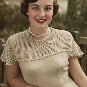 Pretty short-sleeved summer sweater knitting pattern from 1950s