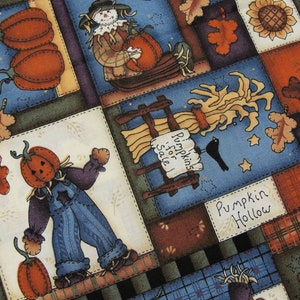 May include: A fabric print featuring a patchwork design with autumn themes including orange pumpkins, scarecrows, sunflowers, and fall leaves. The pattern includes text that reads Pumpkins for Sale and Pumpkin Hollow on a blue and brown background.