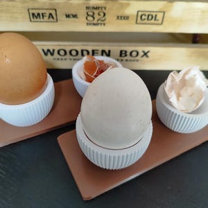 Egg cup set; 2x egg cups including bowls and holder