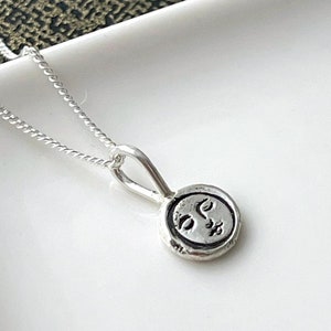 Full moon charm pendant, sterling silver moon face necklace, tiny peaceful smiling moon face, astrological celestial charm, silver eclipse