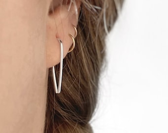 Silver drop hoops, sterling silver hoop earrings, teardrops seamless hoop, infinite hoop in silver, everyday earrings minimalist