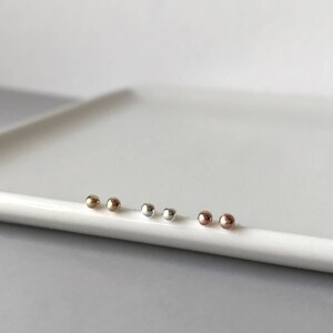 Tiny 14k solid gold dots studs with silver posts recycled gold Teeny yellow gold ball studs earring minimalist jewelry everyday wear image 3