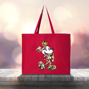 May include: A red tote bag with a Mickey Mouse design. The cartoon character is made up of various Disney character illustrations. The bag has long red handles and is made of a solid red fabric.
