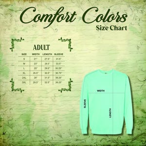 May include: A light green Comfort Colors sweatshirt with a size chart. The chart lists adult sizes S to 3XL, with measurements for width, length, and sleeve length in inches. The text "Comfort Colors" and "Size Chart" are at the top.