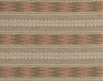 May include: Close-up of a fabric with a repeating striped pattern. The design features horizontal bands of varying widths in shades of beige, peach, and olive green. Some bands have a zigzag pattern, while others have a rope-like texture.