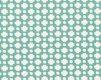 May include: Teal fabric with a white geometric pattern of repeating hexagons.