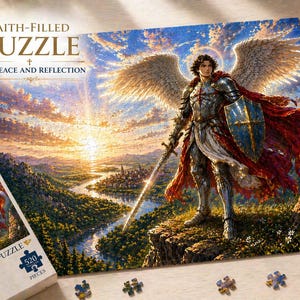 May include: A completed jigsaw puzzle depicting an angel with large wings, holding a sword and shield, set against a landscape with a river and city. The puzzle is labeled "Faith-Filled Puzzle" and includes 520 pieces.