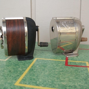 Two Vintage Boston Pencil Sharpeners