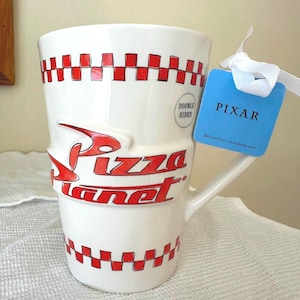 Rae Dunn Double Sided Coffee Mug - ‘Freshest In The Galaxy” Disney Toy Story Pizza Planet Checkers image 1