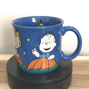 Snoopy Halloween Coffee Mug: Peanuts Gang Pumpkin Patch Design
